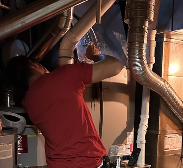 Randys Mechanical_Kyle Working on a Furance 2